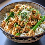 Close-up of a Garlic Butter Ground Turkey Rice Bowl with green beans and Parmesan.