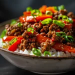 Close-up shot of a One-Pan Herb Chicken & Roasted Veggie Bake, showcasing juicy chicken and colorful roasted vegetables.