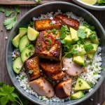 Close-up of a Honey Lime Salmon Bowl with vibrant ingredients.